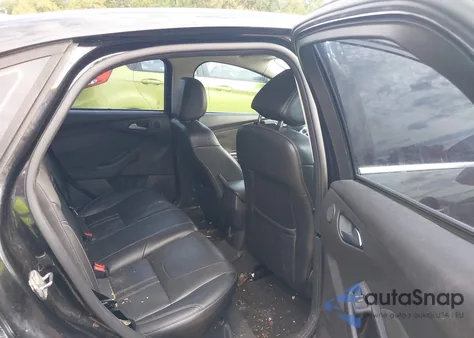 2013 Ford Focus Titanium z USA, uszkodzony, nr VIN 1FADP3J23DL169468